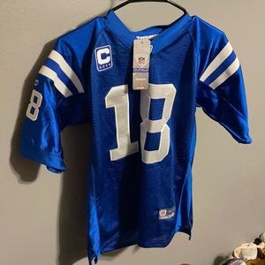 Peyton Manny on the felid football jersey